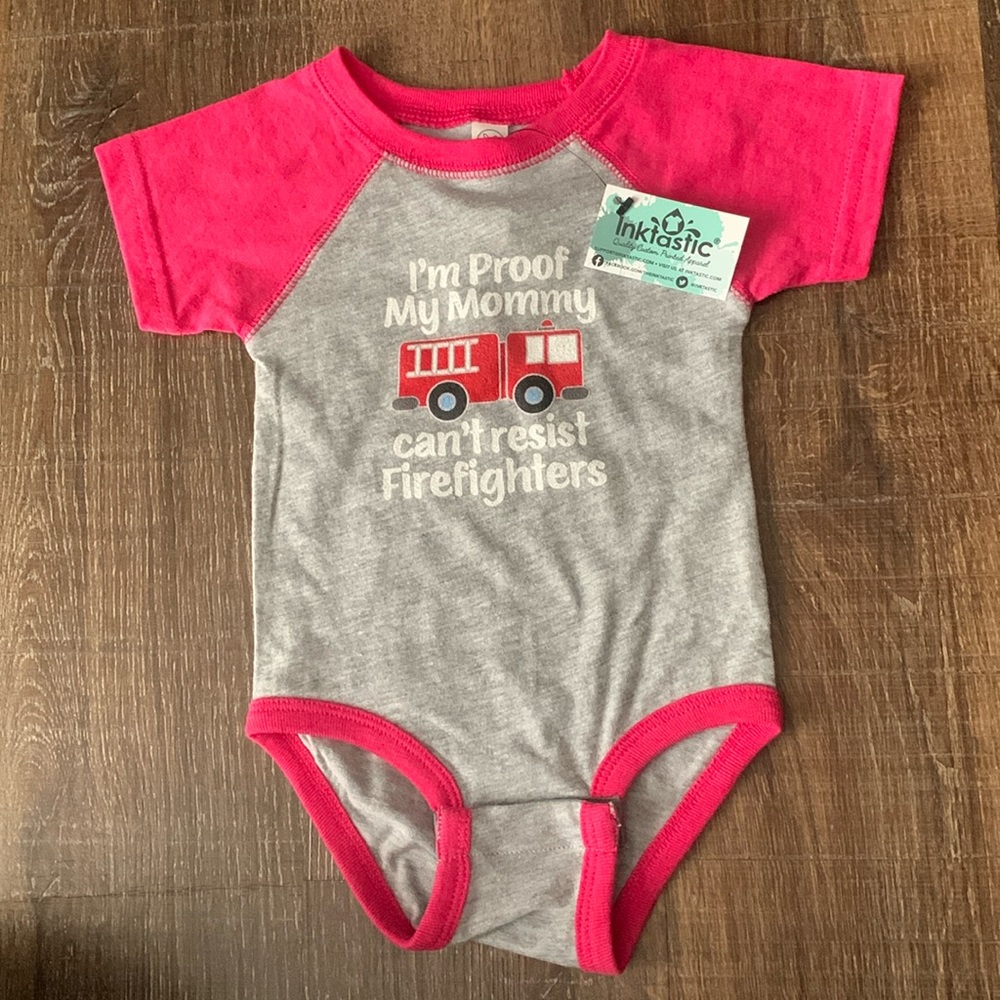 “I’m proof my mommy can’t resist firefighters” onesie